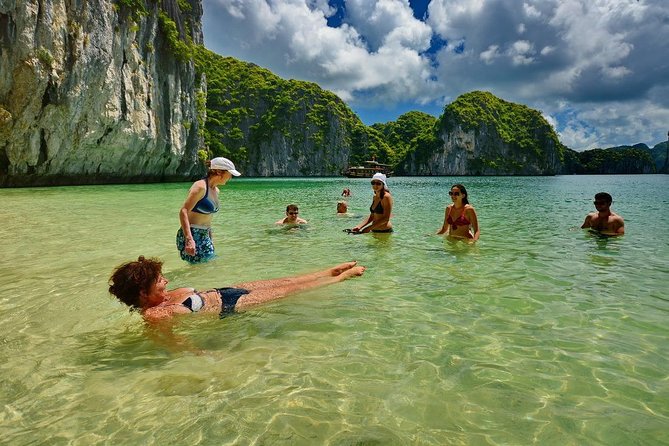 1 Day Boat Tour: HaLong Bay, Lan Ha Bay, Natural Beach and Full Moon Party - Swimming, snorkeling, and the natural beach