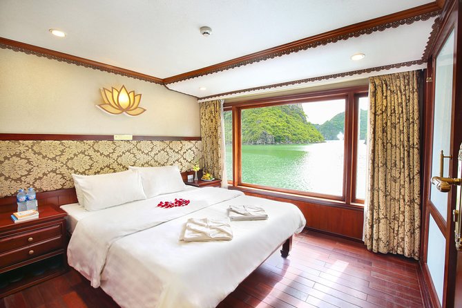 2-Day Oriental Sails Junk Cruise of Halong Bay - Sunrise, tai chi, and Luon Cave on day two