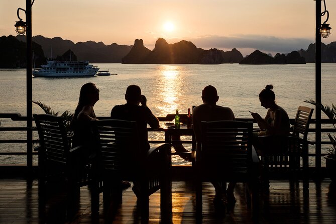 2D1N: Halong Bay 4-Star Cruise - Cave, Kayak, Swim, Meals - Sunset, cooking, tai chi, and squid fishing