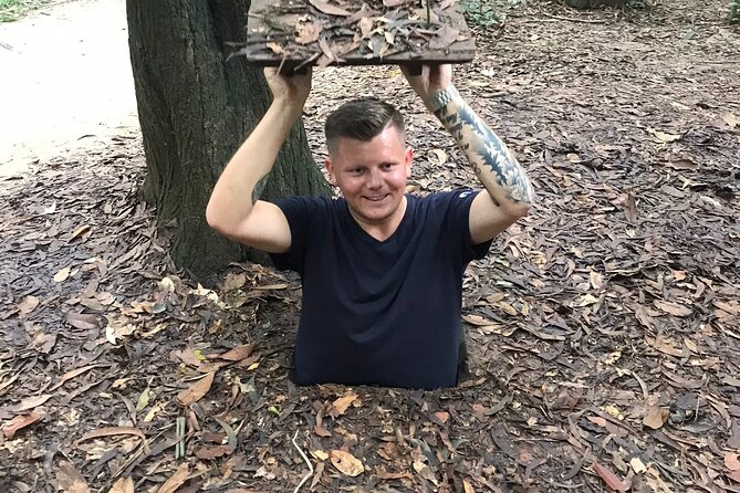 6 Hours Historical Tour in Cu Chi Tunnel with Free Snack - Crawling through a short tunnel section