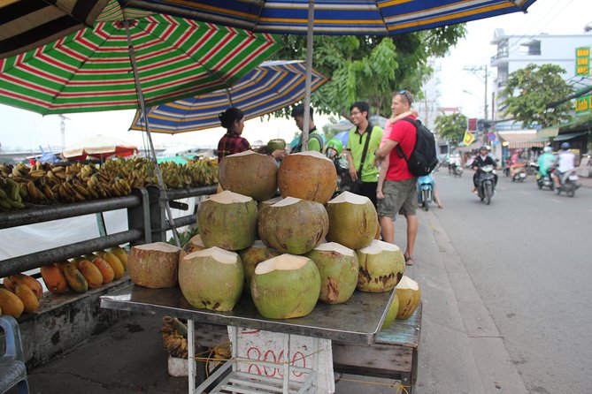 Afternoon Saigon Unseen Adventure by Scooter |Opt: Ao Dai Riders - Thien Hau Pagoda and Chinese-Vietnamese culture