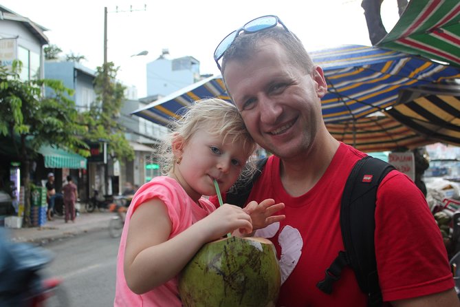 Afternoon Saigon Unseen Adventure by Scooter |Opt: Ao Dai Riders - Food, drinks, and the Ao Dai option