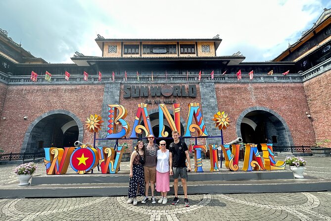 Ba Na Hills and Marble Mountains PrivateTour with Streetfood meal - Walking across the Golden Bridge