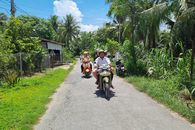 Ben Tre Mekong Zig Zag: Scooter, Sailboat, and Food (Full day) - Sailing into a quieter Mekong tributary