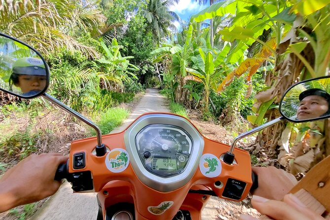 Ben Tre: Scooter, Culture, Sailboat and Mekong Food (Half Day) - Ben Tre market, fruit tasting, and backstreets