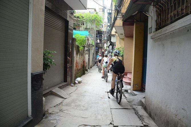 Bicycle Tours Hanoi: Half Day Hanoi City Bicycle Tours - Riding beside Hanoi’s famous train track