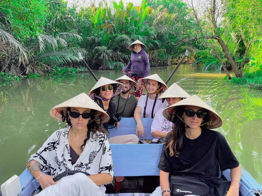 Can Tho: A Real Mekong Tour, Floating Market, Cacao & Life's - Meeting local river life over fresh pineapple