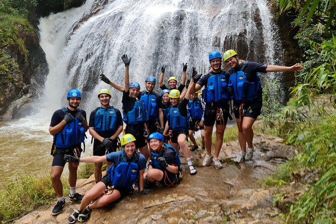 Canyoning Tour in Dalat Viet Nam - The first rappel drops 18 meters beside a waterfall