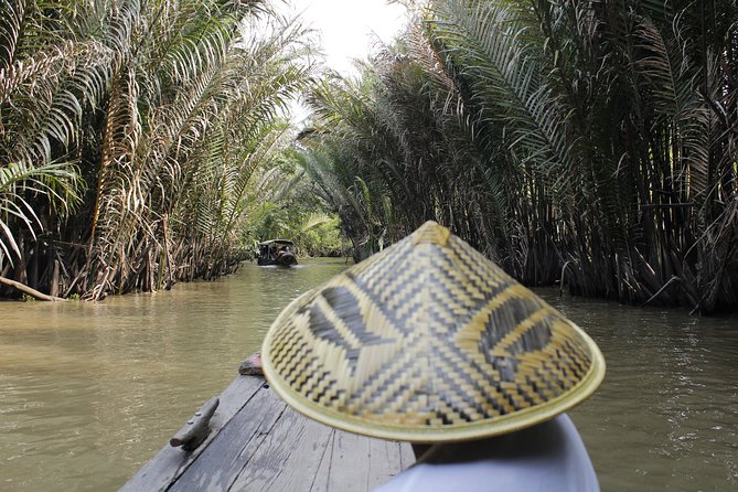 Cu Chi Tunnels and Mekong Delta 1 Day From Ho Chi Minh City - Entering the Cu Chi Tunnels