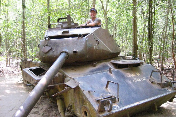 Cu Chi Tunnels & Mekong Delta Tour with VIP Limousine Transfer - Coconut Island, fruit, honey tea, and music