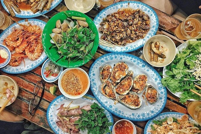 Da Nang By Night: Seafood dinner, night market and cruise trip - Bridges, lights, and the Dragon Bridge show