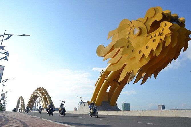 Da Nang Food Tour Motorbike & Sightseeing By Ao Dai Lady Rider - APEC Park for a short riverside walk