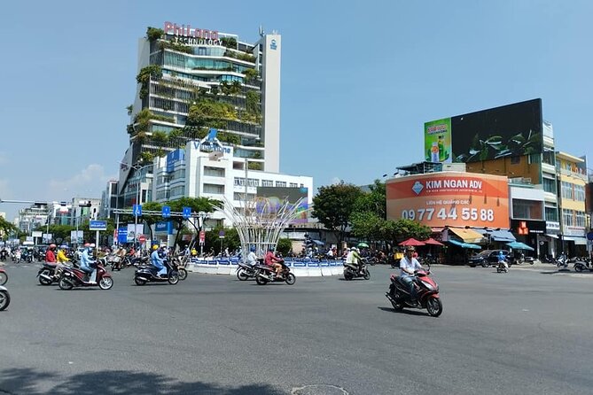 Da Nang Food Tour Motorbike & Sightseeing By Ao Dai Lady Rider - Sun Wheel and Da Nang night market