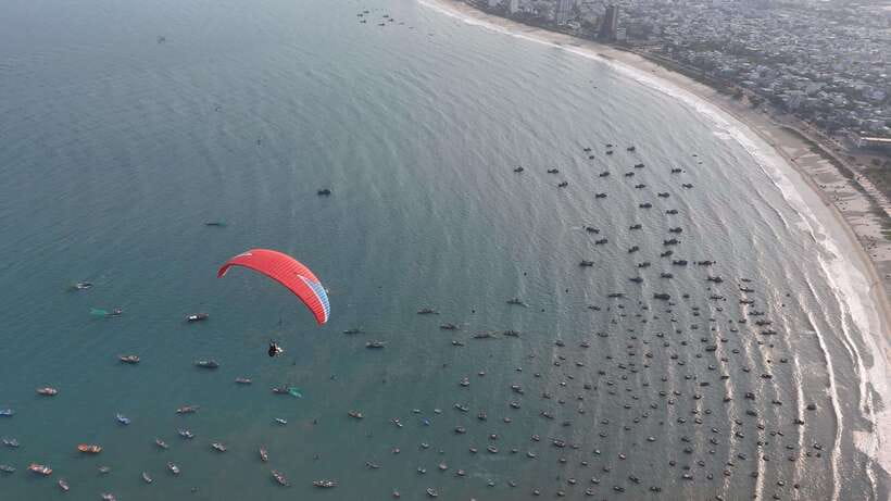 Da Nang Private paragliding experience on Monkey Mountain - Landing near a fishermen’s village