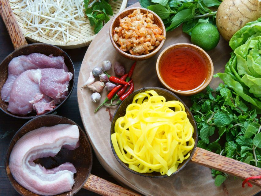 Dalat: Home Cooking Class with Central Market Tour - Eating the meal in the garden