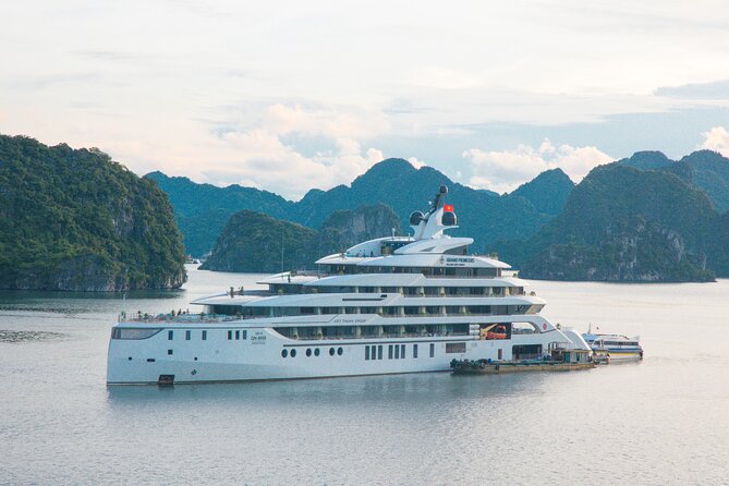 Discover Ha Long Bay in 2 Days and 1 Night Cruise Experience - Boarding a traditional wooden junk