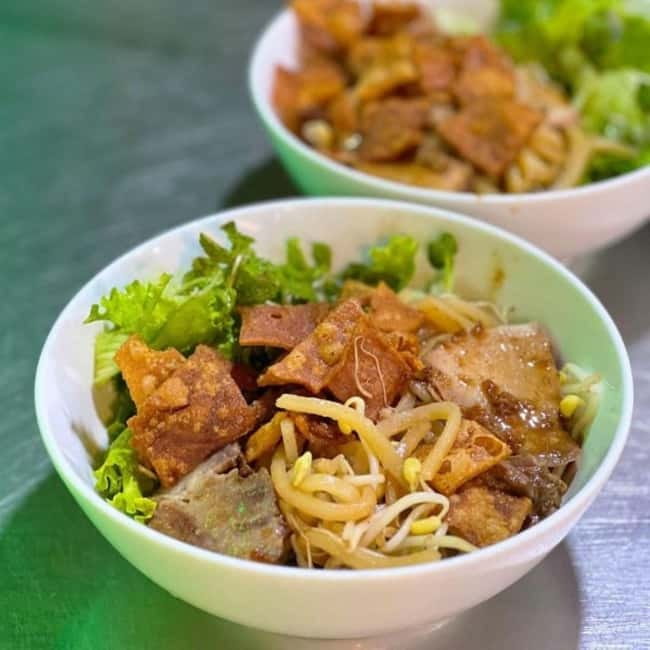 Eat Like a Local – Hoi An Evening Food Tour - Cao lau, chicken rice, and the foods that define Hoi An