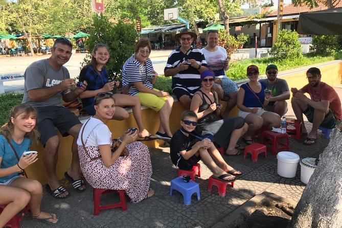 Evening Walking Food Tour, folk game and lantern boat - A folk game beside the river