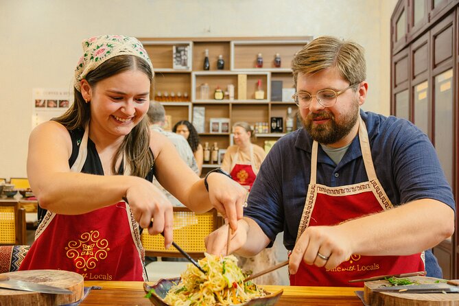 Experience Hanoi Cooking Class with Free Wine Tasting - Four dishes, one shared Vietnamese meal