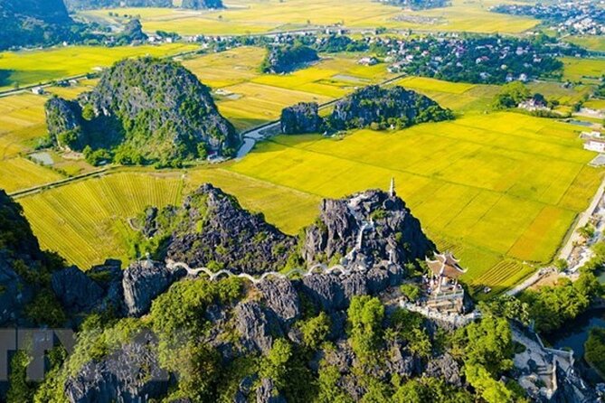 From Hanoi: Hoa Lu, Tam Coc, and Mua Cave Scenic Day Trip - Mua Cave and the climb to Ngoa Long Mountain