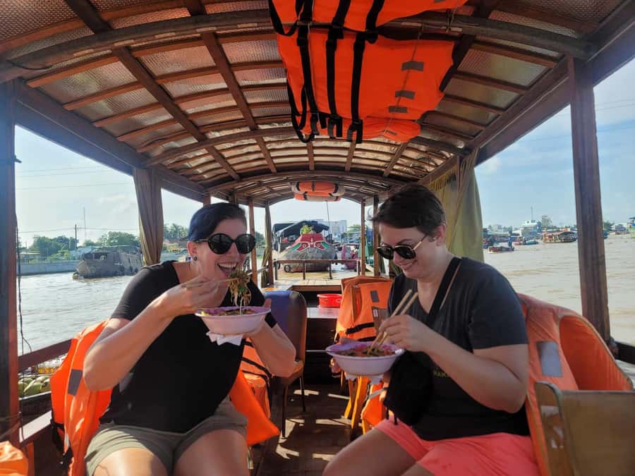 From HCM: Mekong Delta & Cai Rang Floating Market 2-Day Tour - Fruit, honey tea, music, and coconut candy