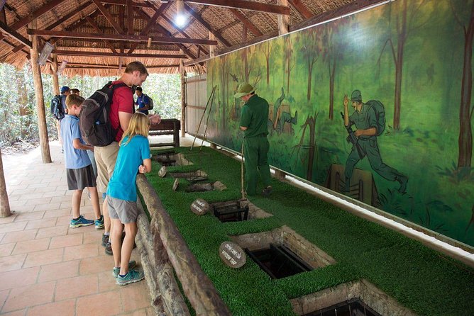 From Ho Chi Minh: Cu Chi Tunnels Half-Day History Tour with Guide - Entering the tunnels and trying the local food