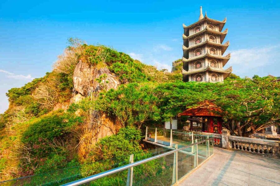 From Hue: Epic Coastline & Hidden Gems Tour to Hoi An - Marble Mountains, caves, shrines, and a tight clock