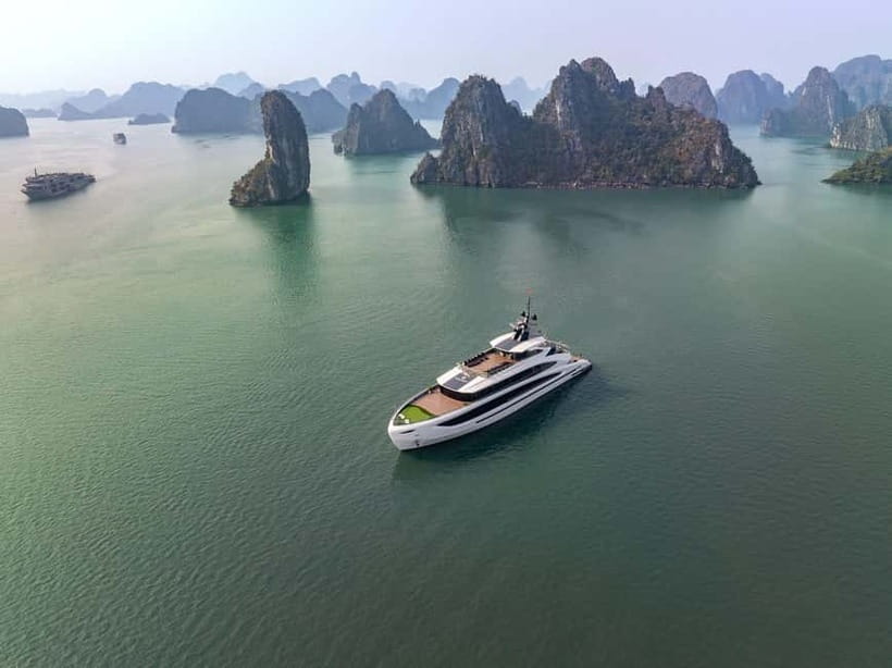 Full Day: Fabulous Halong Bay Tour with Taliya Cruise 5<em> – Key points to know before you book’ /></p>
<ul>
<li><strong>Two bays in one day:</strong> The route links Halong Bay with the quieter scenery of Lan Ha Bay.</li>
<li><strong>Bamboo boat at Dark and Bright Cave:</strong> A local rower takes you through a calm cave and into a lagoon.</li>
<li><strong>Real time in the water:</strong> Ao Ech offers kayaking and swimming, something not every cruise allows.</li>
<li><strong>A long but useful transfer:</strong> Hanoi pickup uses the expressway, yet the road portion can still take several hours each way.</li>
<li><strong>Strong service is a major attraction:</strong> Guides named Frank, Chung Hoeng Van, and Vin received special praise for being helpful and flexible.</li>
<li><strong>Good value at $57:</strong> Lunch, entrance fees, activities, afternoon tea, and the cruise are included, while extra drinks cost more.</li>
</ul>
<h2 id="the-57-question-what-you-really-get">The $57 question: what you really get</h2>
<p><img width="820" height="614" decoding="async" src=