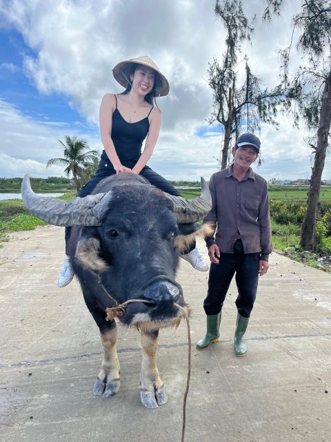 Funny day cycling, Buffalo riding and Basket boat - Cycling through Cam Thanh’s water coconut village