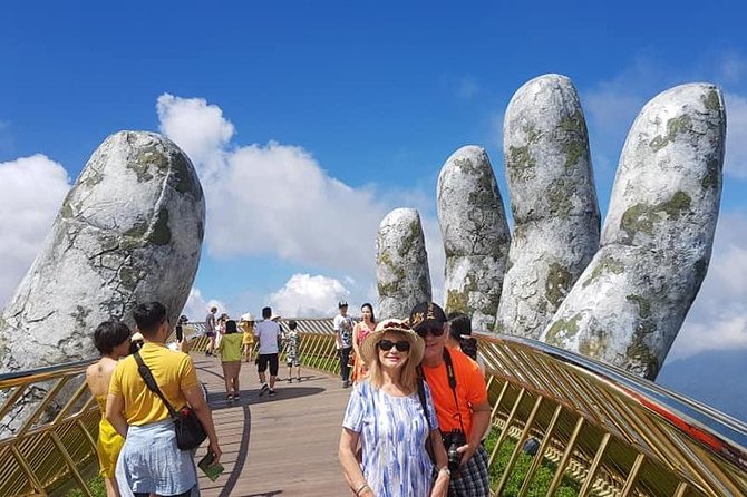 Golden Bridge-Marble Mountain-Hoi An City -Boat Ride-Night Market - Ba Na Hills begins with a high cable-car ride