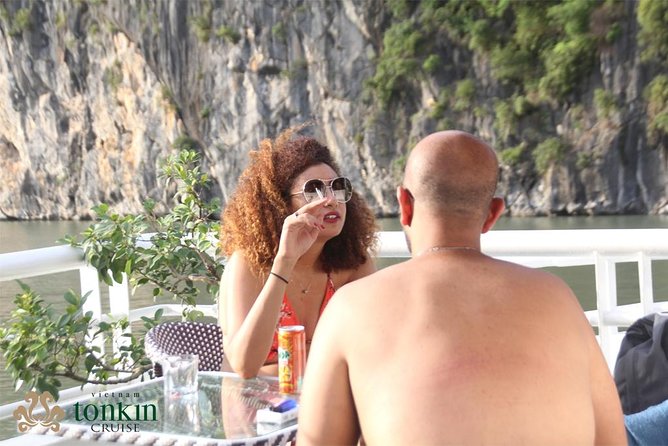 Ha Long Bay Cruise Day Tour with lunch, kayaking, surprise cave & titop island - Kayaking or a bamboo boat at Luon Cave