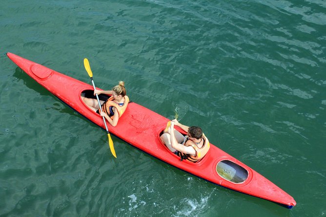 Ha Long Bay Cruise Day Tour with lunch, kayaking, surprise cave & titop island - A sunset ride, snacks, and the return to Hanoi