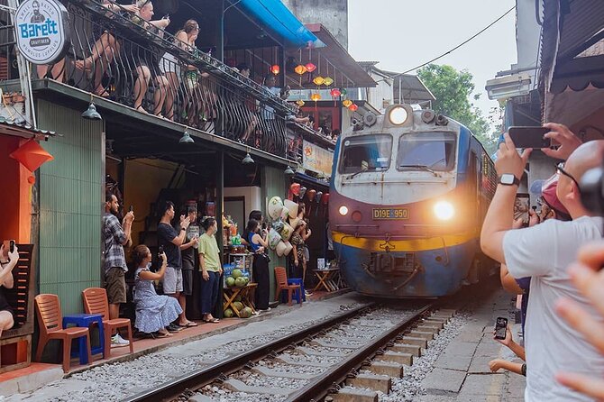 Half-Day Hanoi Highlights and Train Street Experience - Coffee beside the railway at Train Street