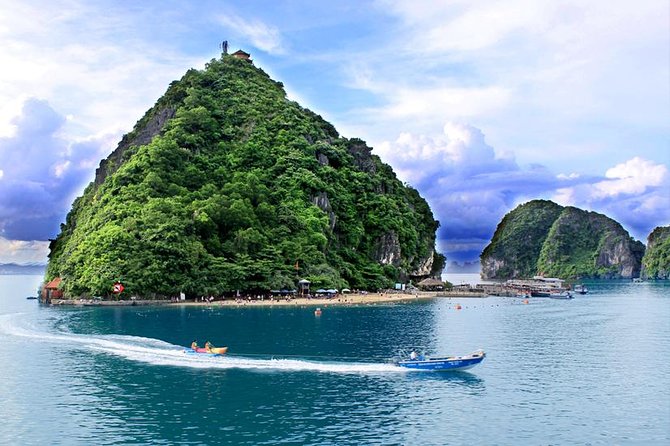 Halong 6 hours Boat tour with Cave, Kayak, lunch, transfer high-way from Hanoi - Ti Top Island for beach time and a high view