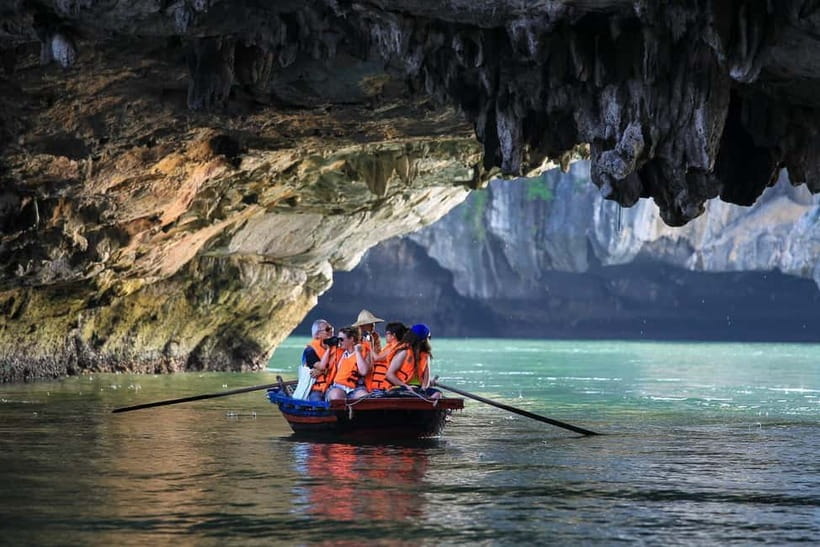 Halong 6 Hours Cruise: Kayak, Cave, Lunch, Beach & Island - Sung Sot Cave: impressive formations, busy pathways