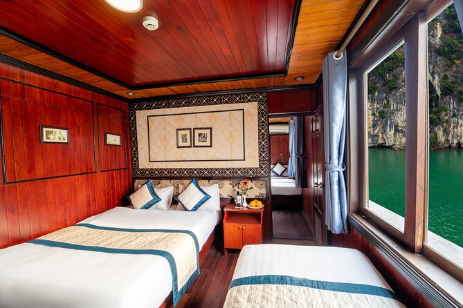 Halong Bay 2 Days 1 Night Traditional Boat - Ti Top Island: beach, clear water, and a climb