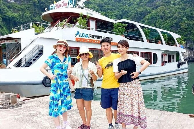Halong bay 4 hours boat tour from Halong city with 2 caves, kayak - Dinh Huong and Fighting Cock Islets