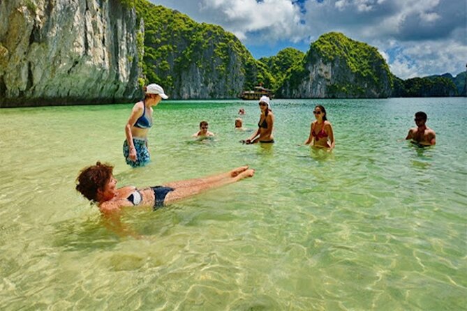 Halong Bay Day Tour 6Hour Deluxe Cruise Limousine Bus Small Group - Titop Island for swimming or a panoramic climb
