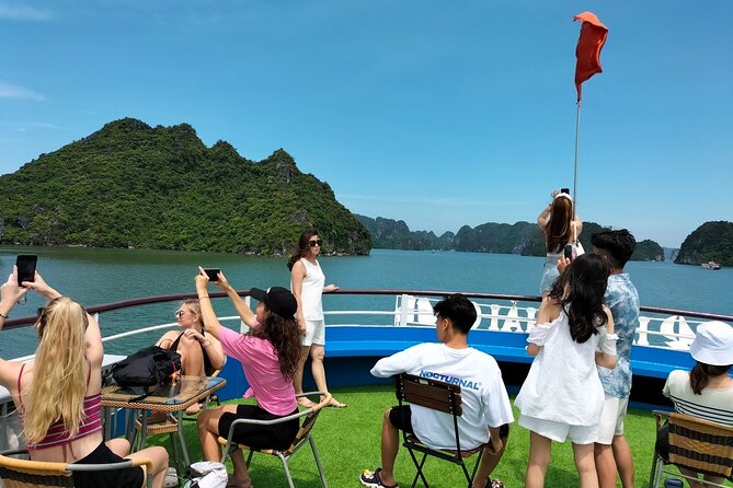 Halong Bay Day Tour With Titop Island, Cave, Kayak & Lunch - Kayaking or bamboo boating at Luon Cave