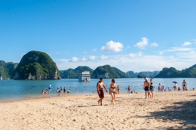 Halong Bay Day Tour With Titop Island, Cave, Kayak & Lunch - Titop Island, beach time, and the best view of the day