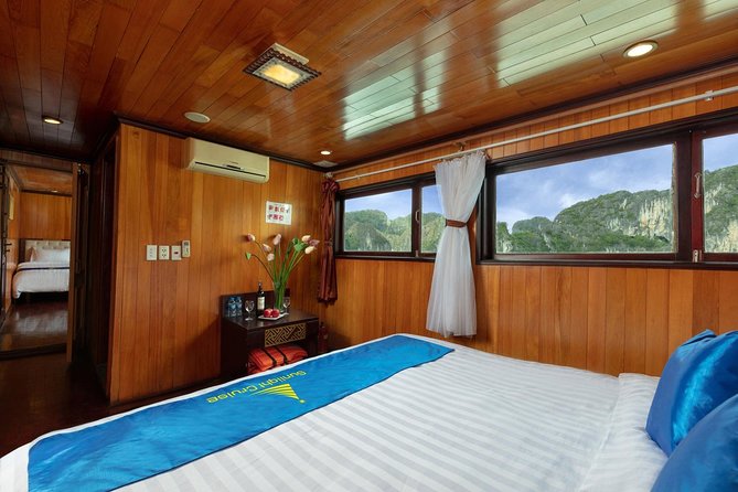 Halong deluxe cruise 2D/1N: Surprise cave, Titop island, Full Meals, best prices - Boarding at noon and settling into the cabin