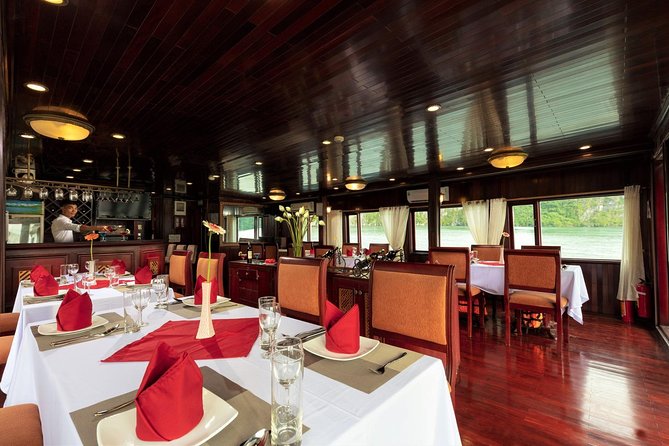 Halong deluxe cruise 2D/1N: Surprise cave, Titop island, Full Meals, best prices - Sunset, dinner, and a night afloat