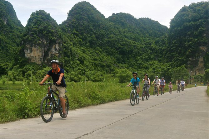 Hang Mua - Hoa Lu - Tam Coc Small Group Tour 8 People a Group - Cycling through Ninh Binh’s rice country
