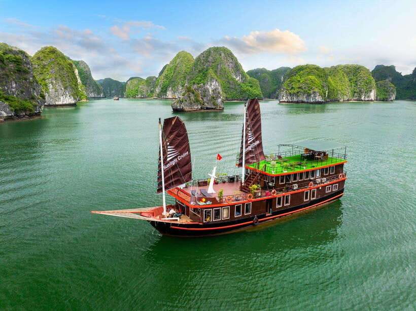 Hanoi: 2-Day Ha Long and Lan Ha Bay Cruise with Kayaking - Sunset, spring rolls, and squid fishing after dark