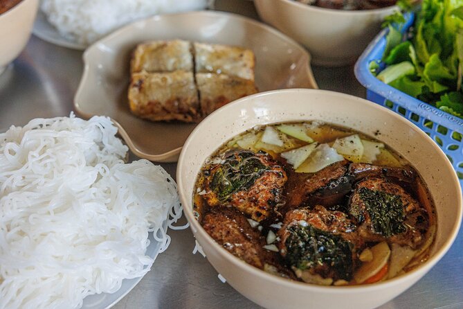 Hanoi After Dark Vespa Tour (4 hours): Street Food & Night Vibes - Hanoi Train Street as the final stop