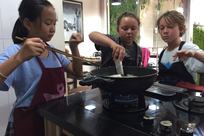 Hanoi Cooking Class and Market Tour in Ancient House - Cooking four dishes by hand