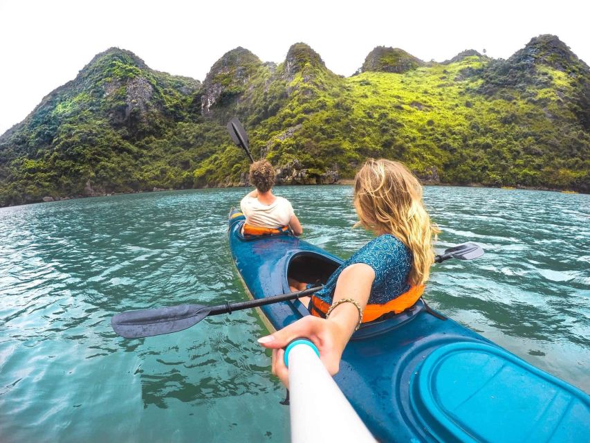 Hanoi: Halong Bay Day Trip with Titop Island, Cave, & Kayak - Kayaking or bamboo boat rowing at Luon Cave