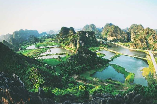 Hanoi - Hoa Lu - Tam Coc - Mua Cave - 1 Day Tour. By Luxury Limousine From Hanoi - Tam Coc by boat: the scenic centerpiece