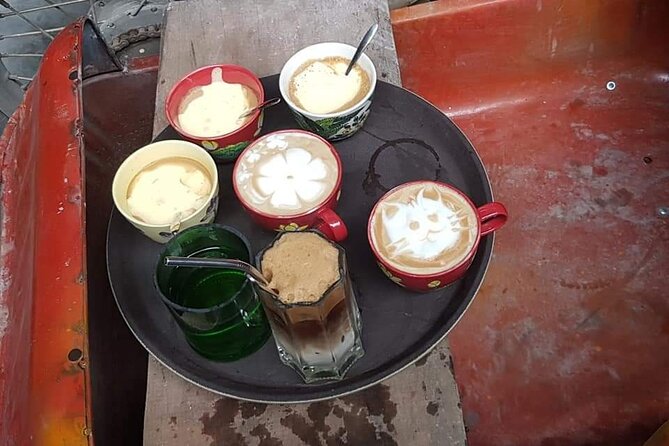 Hanoi Jeep Tour: Food, Culture and Fun by Vietnam Army Jeep - Train Street with coffee and a passing train
