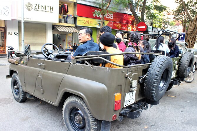 Hanoi Jeep Tours Led By Women: City & Red River Half Day - Huu Tiep Lake and the downed B-52